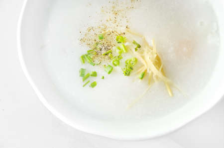 Rice gruel with egg close up, Healthy eating の写真素材