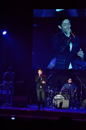 BANGKOK, THAILAND  NOV 18 : Boy Peacemaker or Anuwat Sanguansakphakdee Christian singer singing and show in Crossover Live  Concert on 18 November 2012 at Bangkok Christian College, Bangkok, Thailandのeditorial素材