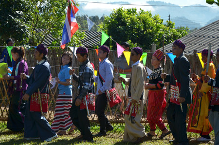 CHIANG MAI, THAILAND - DECEMBER 5 : Manau traditional event of Kachin's tribe to worship God and wish The king of Thailand on 5 December 2012 at Banmai Samahki, Chiang Dao, Chiang Mai, Thailandのeditorial素材