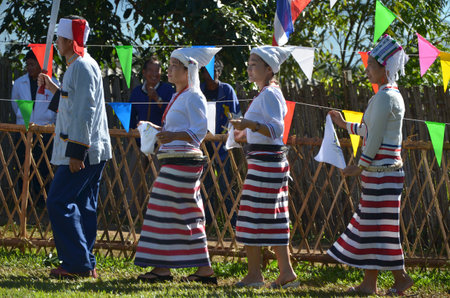 CHIANG MAI, THAILAND - DECEMBER 5 : Manau traditional event of Kachin's tribe to worship God and wish The king of Thailand on 5 December 2012 at Banmai Samahki, Chiang Dao, Chiang Mai, Thailandのeditorial素材