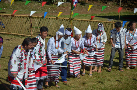 CHIANG MAI, THAILAND - DECEMBER 5 : Manau traditional event of Kachin's tribe to worship God and wish The king of Thailand on 5 December 2012 at Banmai Samahki, Chiang Dao, Chiang Mai, Thailandのeditorial素材