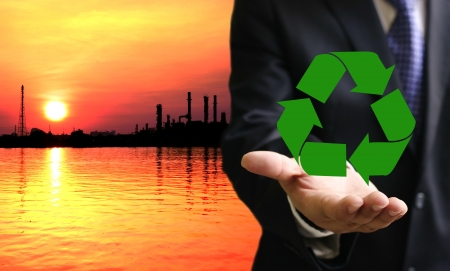 Businessman with recycle symbol guarantee の写真素材