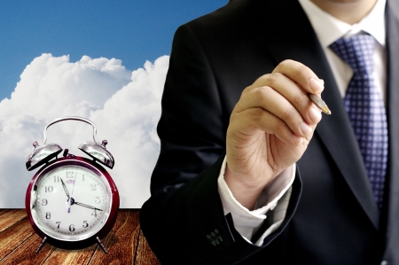 Businessman sign contract with time limit conceptの写真素材