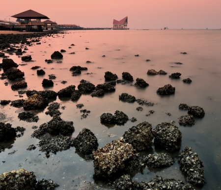 Sea and stone at Sriracha, Chonburi, Thailandの写真素材