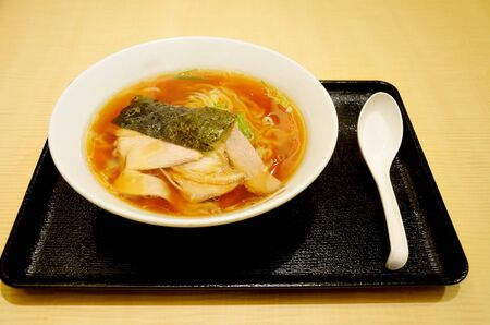 Japanese noodle with soup on trayの写真素材