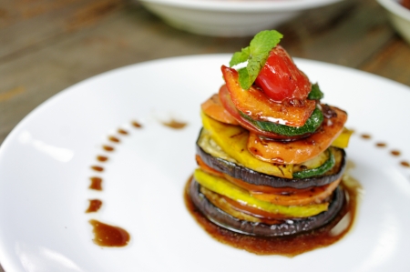 Vegetarian food on white dishの写真素材