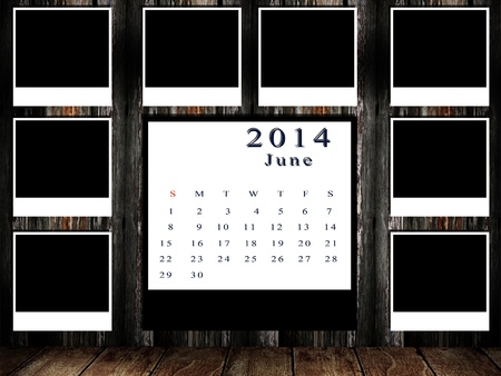 Calendar 2014 set with photo frame on grunge wallの写真素材