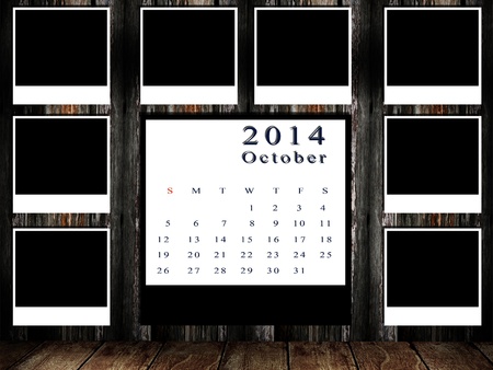 Calendar 2014 set with photo frame on grunge wallの写真素材
