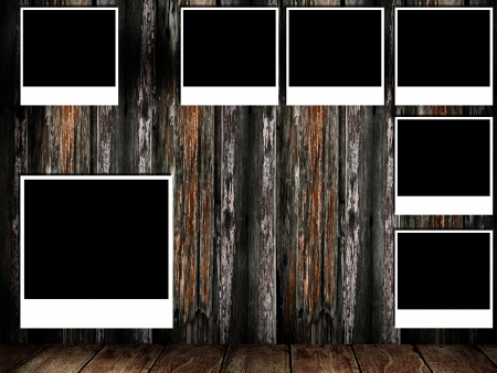 Photo frame on wooden wall, Vintage conceptの写真素材