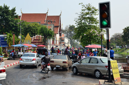 CHIANG MAI, THAILAND - APRIL 12 : People celebrating Songkran (Thai new year / water festival) in the streets by throwing water at each other on 12 April 2013 in Chiang Mai, Thailandのeditorial素材