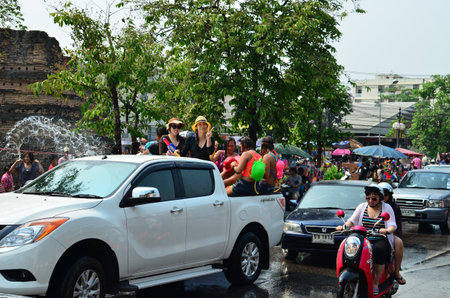 CHIANG MAI, THAILAND - APRIL 12 : People celebrating Songkran (Thai new year / water festival) in the streets by throwing water at each other on 12 April 2013 in Chiang Mai, Thailandのeditorial素材