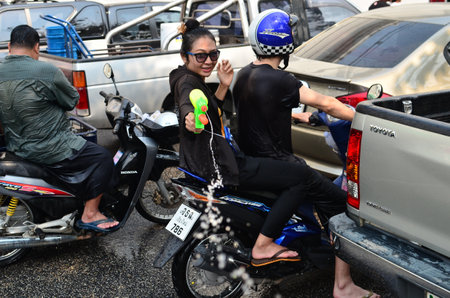 CHIANG MAI, THAILAND - APRIL 12 : People celebrating Songkran (Thai new year / water festival) in the streets by throwing water at each other on 12 April 2013 in Chiang Mai, Thailandのeditorial素材