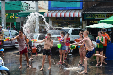 CHIANG MAI, THAILAND - APRIL 12 : People celebrating Songkran (Thai new year / water festival) in the streets by throwing water at each other on 12 April 2013 in Chiang Mai, Thailandのeditorial素材