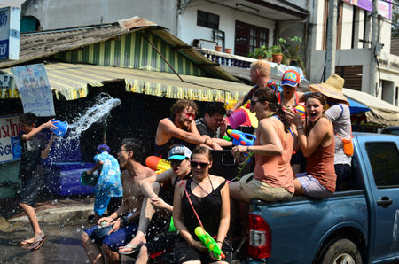 CHIANG MAI, THAILAND - APRIL 13 : People celebrating Songkran (Thai new year / water festival) in the streets by throwing water at each other on 13 April 2013 in Chiang Mai, Thailandのeditorial素材