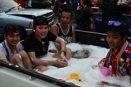 CHIANG MAI, THAILAND - APRIL 13 : Teenagers bathing in truck for celebrating Songkran (Thai new year / water festival) in the streets on 13 April 2013 in Chiang Mai, Thailandのeditorial素材