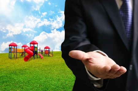 Businessman offer Children s playground project の写真素材