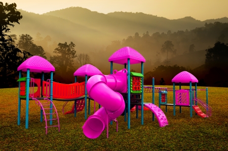 Children s playground with morning landscape background の写真素材