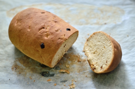 Homemade raisin bread in trayの写真素材