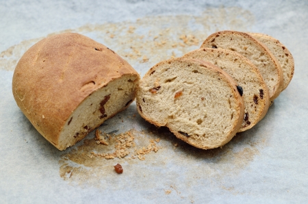 Homemade raisin bread in trayの写真素材
