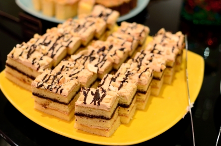 Cake in yellow dish, Coffee break conceptの写真素材