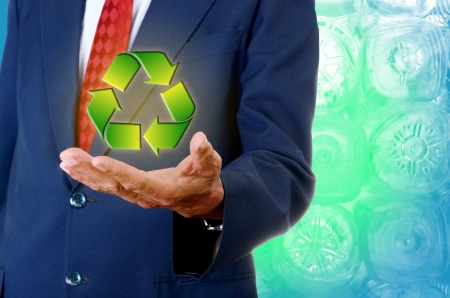 Senior businessman handheld recycle symbol, Sustainability business conceptの写真素材