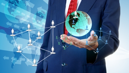 Businessman accessing global social network, Network business conceptの写真素材