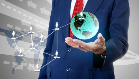 Businessman accessing global social networkの写真素材