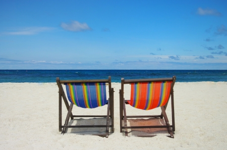Beach chair with sea and sky backgroundの写真素材