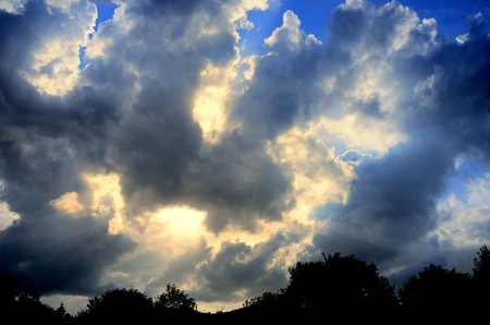 Drama sun ray with cloud in blue skyの写真素材