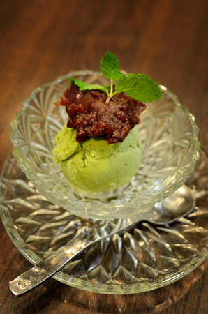 Green tea ice-cream with red bean topping in Japanese styleの写真素材