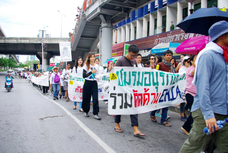 BANGKOK, THAILAND - SEPTEMBER 22   People walking for against the construction of a dam in Mae Wong National Park on 22 September 2013 at Victory monument, Bangkok, Thailandのeditorial素材