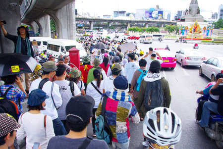 BANGKOK, THAILAND - SEPTEMBER 22   People walking for against the construction of a dam in Mae Wong National Park on 22 September 2013 at Victory monument, Bangkok, Thailandのeditorial素材