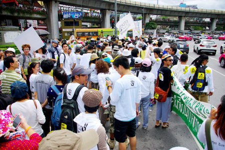 BANGKOK, THAILAND - SEPTEMBER 22   People walking for against the construction of a dam in Mae Wong National Park on 22 September 2013 at Victory monument, Bangkok, Thailandのeditorial素材