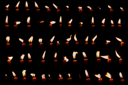 Set of candle light isolated on black の写真素材