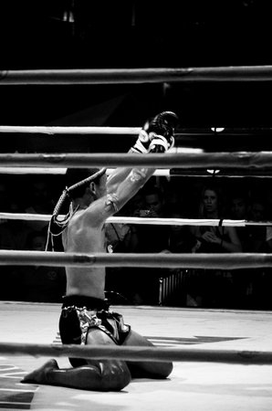 BANGKOK, THAILAND -  OCTOBER 9   Unidentified fighter first performs the respect Wai Khru Ram Muay  before fighing in MBK fight night on 9 October 2013 at MBK Center, Bangkok, Thailandのeditorial素材