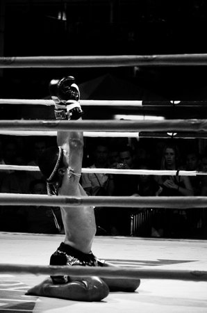 BANGKOK, THAILAND -  OCTOBER 9   Unidentified fighter first performs the respect Wai Khru Ram Muay  before fighing in MBK fight night on 9 October 2013 at MBK Center, Bangkok, Thailandのeditorial素材