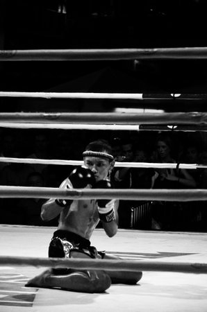 BANGKOK, THAILAND -  OCTOBER 9   Unidentified fighter first performs the respect Wai Khru Ram Muay  before fighing in MBK fight night on 9 October 2013 at MBK Center, Bangkok, Thailandのeditorial素材