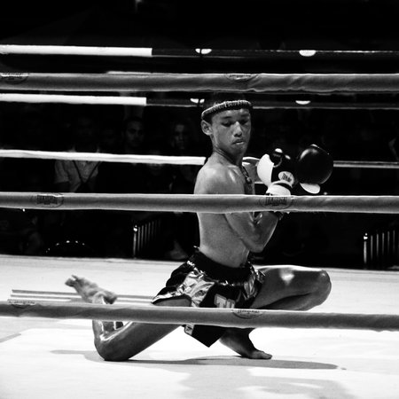 BANGKOK, THAILAND -  OCTOBER 9   Unidentified fighter first performs the respect Wai Khru Ram Muay  before fighing in MBK fight night on 9 October 2013 at MBK Center, Bangkok, Thailandのeditorial素材