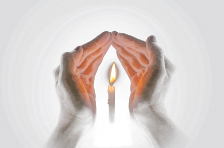 Candle light in hand with abstract styleの写真素材