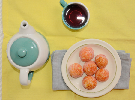 Moon cake with tea potの写真素材