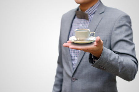 Coffee break concept, Businessman drink hot coffeeの写真素材
