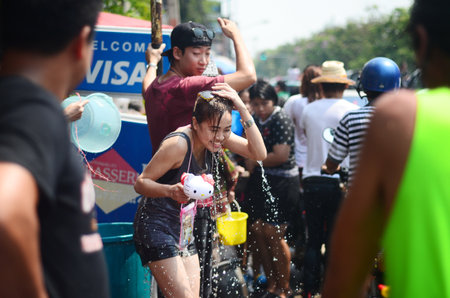 CHIANG MAI, THAILAND - APRIL 13   Chiangmai Songkran festival Unidentified men and women traveler Like to join the fun with splashing water on 13 April 2014 in Chiang Mai, Thailand のeditorial素材