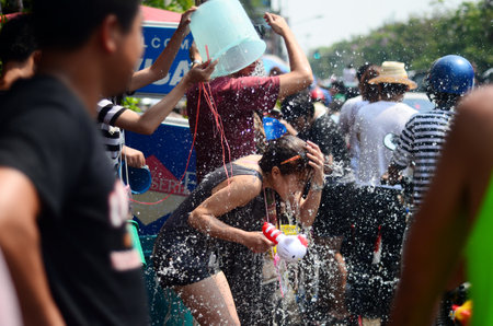 CHIANG MAI, THAILAND - APRIL 13   Chiangmai Songkran festival Unidentified men and women traveler Like to join the fun with splashing water on 13 April 2014 in Chiang Mai, Thailand のeditorial素材