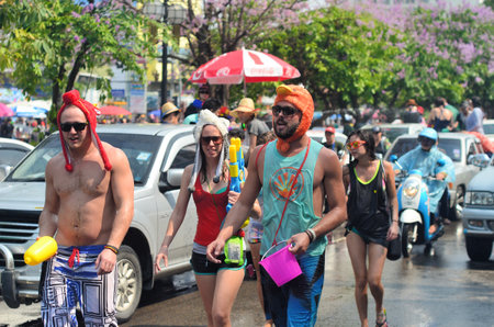 CHIANG MAI, THAILAND - APRIL 13   People celebrating Songkran  Thai new year   water festival  in the streets by throwing water at each other on 13 April 2014 in Chiang Mai, Thailand のeditorial素材