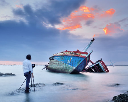CHONBURI- JUNE 20   Mr Dan take photo his shipwreck on June 20, 2014 in Ang Sila, Chonburi, Thailand  のeditorial素材