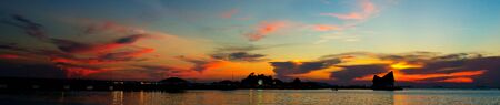 Panoramic sunset sky with silhouette of island Kho Loi Landscapeの写真素材