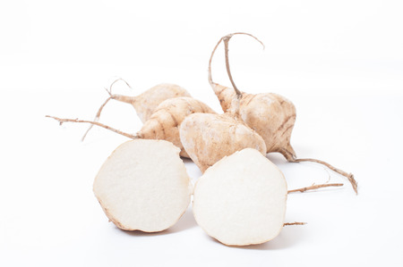 Whole Jicama isolated on white backgroundの写真素材