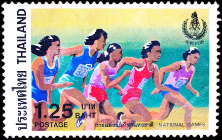 THAILAND - CIRCA 1984 : A stamp printed in Thailand shows image of Athletics for remind National Games, circa 1984のeditorial素材