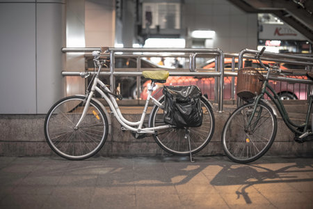 BANGKOK, THAILAND - NOVEMBER 23 : Two bicycles parking under BTS station on 23 November 2014 in Bangkok, Thailandのeditorial素材