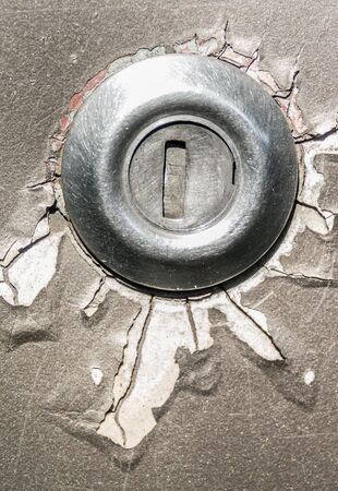 Old key hole with color damageの写真素材